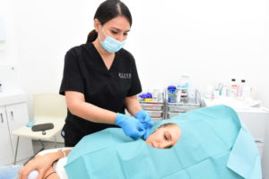 Female client having facelift treatment