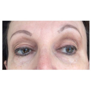 close up of females client eyes and eye brows