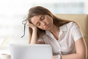 Female Sleeping at her Desk